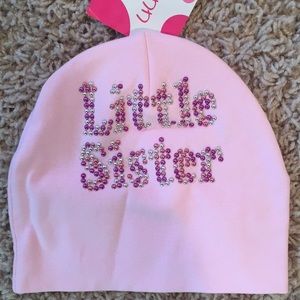 NEW - “little sister” cap. Super cute.
